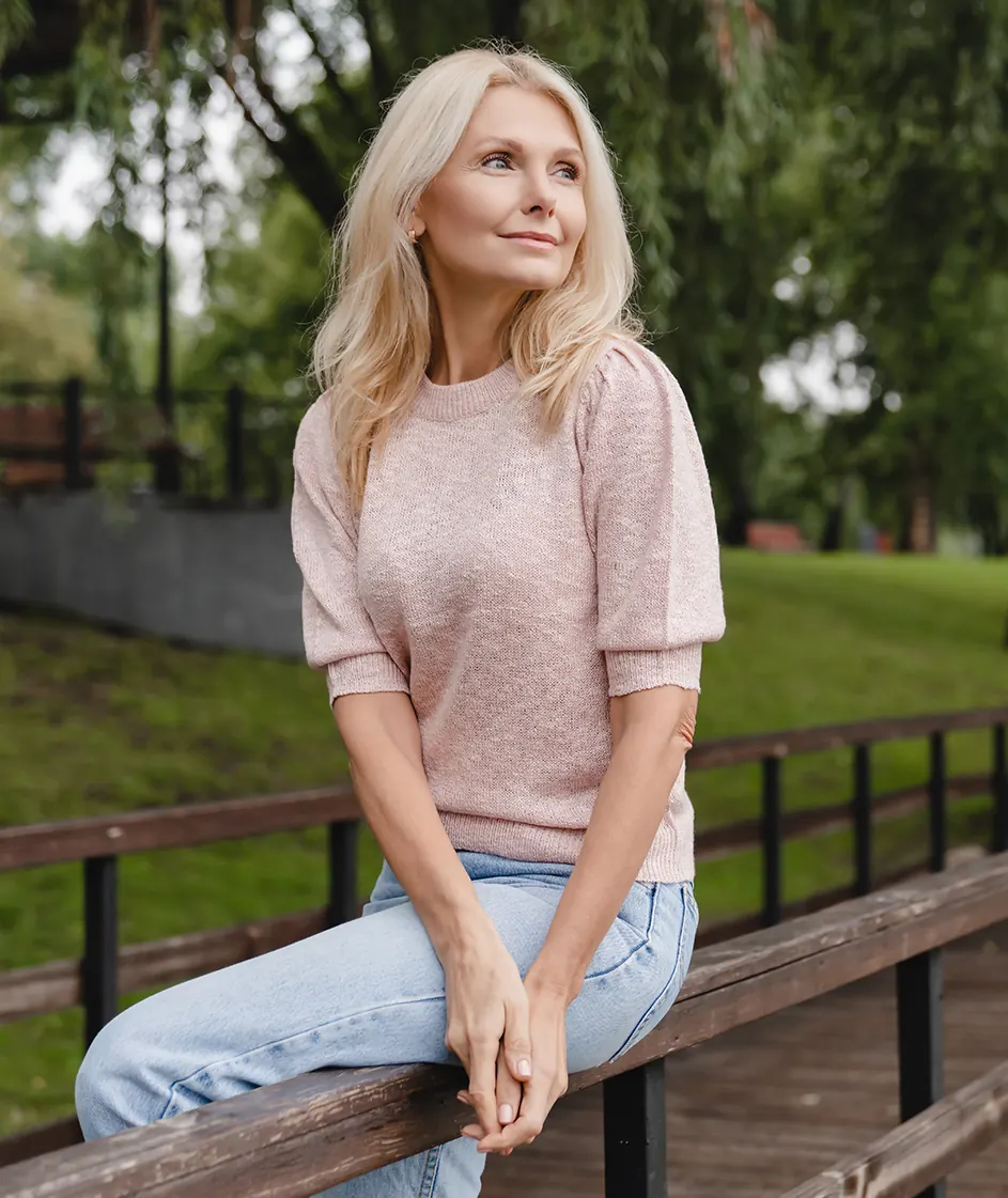 portrait of relaxed senior woman in nature